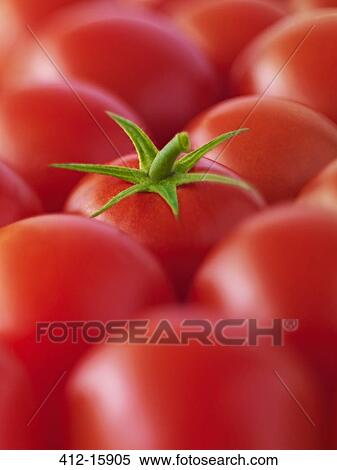 Stock Photography - Extreme close up of red tomatoes. Fotosearch