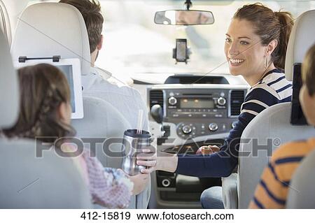 Family inside car View Large Photo Image Stock Photo - Family inside car. Fotosearch