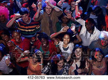 Fans cheering at music festival View Large Photo Image Stock Image - Fans cheering at music festival. Fotosearch