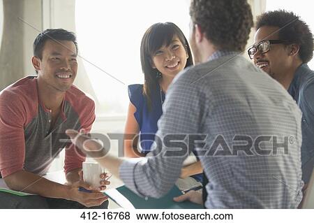 Happy creative business people in meeting View Large Photo Image Stock Photo - Happy creative business people in meeting. Fotosearch