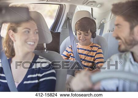 Happy family inside car View Large Photo Image Picture - Happy family inside car. Fotosearch