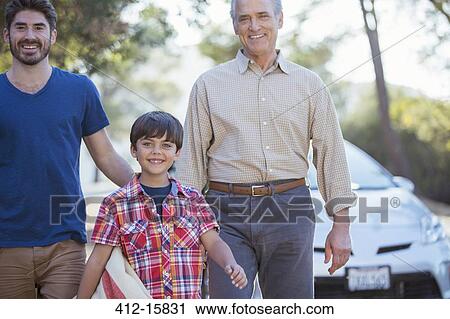 Happy multi-generation men outside car View Large Photo Image Stock Image - Happy multi-generation men outside car. Fotosearch