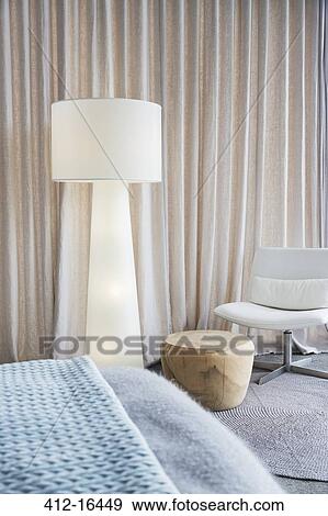 Lamp in modern bedroom View Large Photo Image Stock Photo - Lamp in modern bedroom. Fotosearch