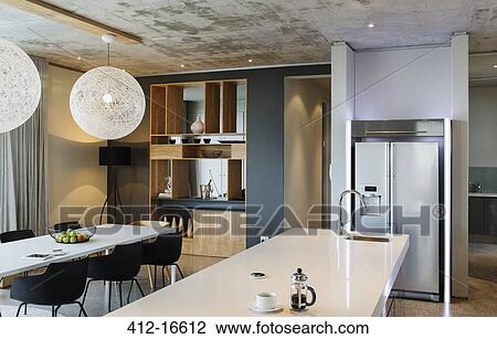 Modern dining room and kitchen View Large Photo Image Stock Image - Modern dining room and kitchen. Fotosearch