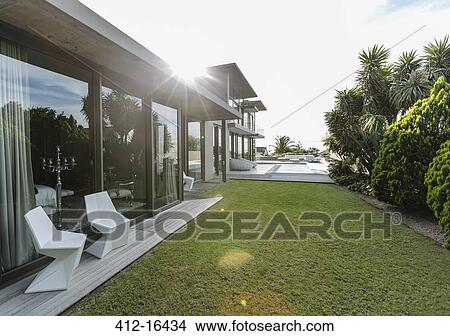 Modern house and yard View Large Photo Image Picture - Modern house and yard. Fotosearch