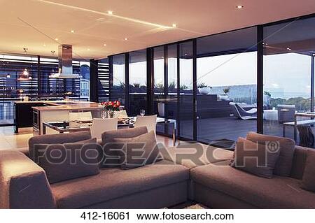 Modern living room overlooking balcony View Large Photo Image Stock Image - Modern living room overlooking balcony. Fotosearch
