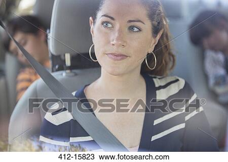 Pensive woman inside car View Large Photo Image Stock Image - Pensive woman inside car. Fotosearch