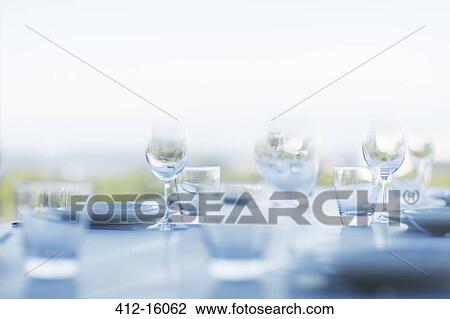 Place settings on patio table View Large Photo Image Stock Image - Place settings on patio table. Fotosearch