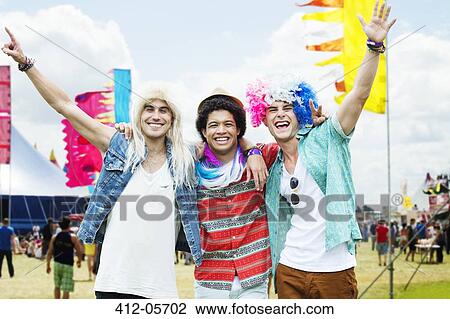 Portrait of cheering friends in wigs at music festival View Large Photo Image Stock Image - Portrait of cheering friends in wigs at music festival. Fotosearch