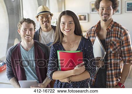 Portrait of confident casual business people in office View Large Photo Image Stock Image - Portrait of confident casual business people in office. Fotosearch
