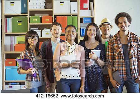Portrait of confident creative business people in office View Large Photo Image Stock Image - Portrait of confident creative business people in office. Fotosearch
