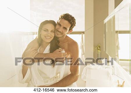 Portrait of couple hugging in bathroom View Large Photo Image Stock Photograph - Portrait of couple hugging in bathroom. Fotosearch