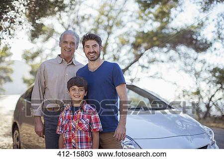 Portrait of multi-generation men outside car View Large Photo Image Stock Image - Portrait of multi-generation men outside car. Fotosearch