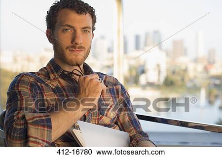 Portrait of serious casual businessman View Large Photo Image Stock Image - Portrait of serious casual businessman. Fotosearch