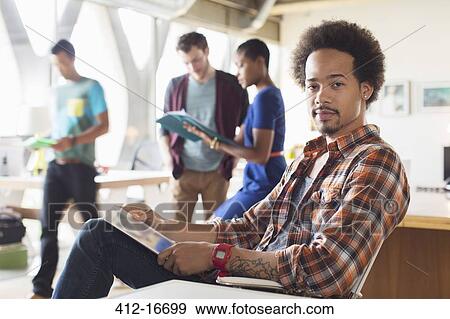 Portrait of serious creative businessman in office View Large Photo Image Stock Photo - Portrait of serious creative businessman in office. Fotosearch