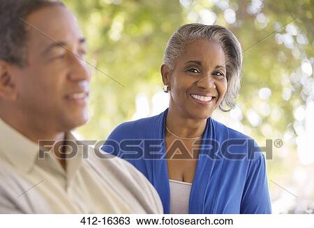 Portrait of smiling senior woman View Large Photo Image Stock Image - Portrait of smiling senior woman. Fotosearch