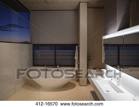 Stock Image - Soaking tub in modern bathroom. Fotosearch