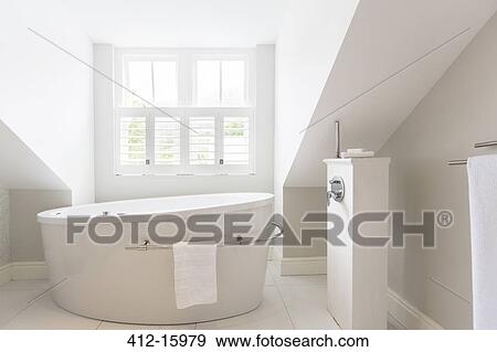 Soaking tub in modern bathroom View Large Photo Image Stock Photo - Soaking tub in modern bathroom. Fotosearch