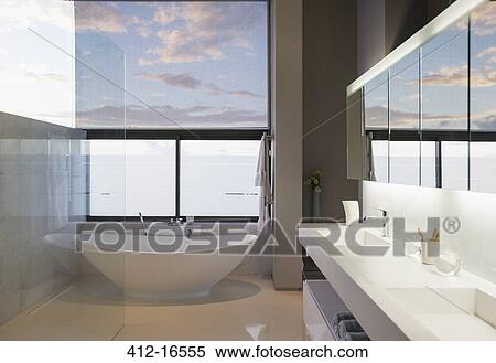 Soaking tub in modern bathroom View Large Photo Image Stock Photography - Soaking tub in modern bathroom. Fotosearch