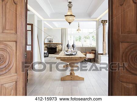 Wooden doors leading to dining room View Large Photo Image Stock Image - Wooden doors leading to dining room. Fotosearch