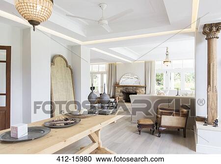 Wooden table in luxury dining room View Large Photo Image Stock Image - Wooden table in luxury dining room. Fotosearch