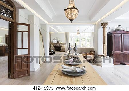 Stock Photography - Wooden table in luxury dining room. Fotosearch
