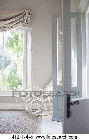 Antique rocking chair in bedroom corner View Large Photo Image Stock Photography - Antique rocking chair in bedroom corner. Fotosearch