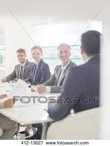 Business people meeting in conference room View Large Photo Image Stock Photo - Business people meeting in conference room. Fotosearch