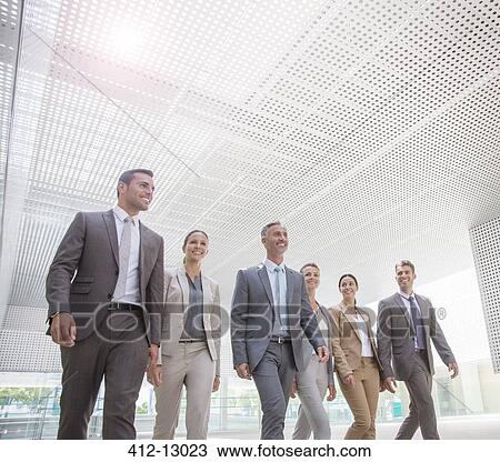 Business people walking View Large Photo Image Stock Image - Business people walking. Fotosearch