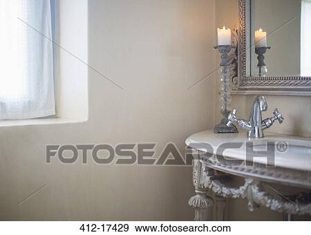 Candle burning in luxury bathroom View Large Photo Image Stock Photo - Candle burning in luxury bathroom. Fotosearch