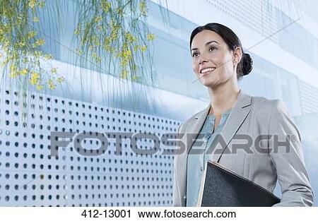Confident businesswoman outdoors View Large Photo Image Stock Image - Confident businesswoman outdoors. Fotosearch