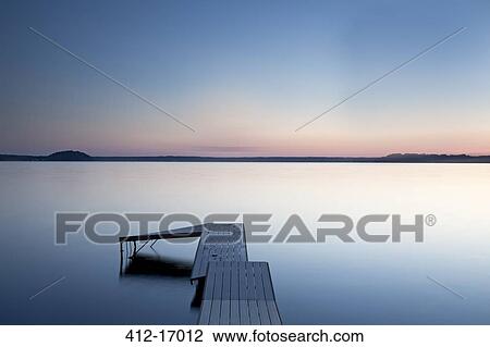 Dock over still lake, Saratoga Lake, New York, United States View Large Photo Image Stock Image - Dock over still lake, Saratoga Lake, New York, United States. Fotosearch