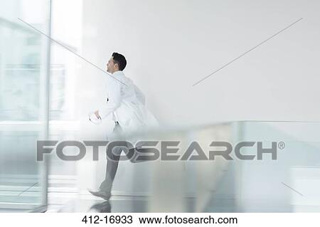 Doctor running in hospital View Large Photo Image Stock Image - Doctor running in hospital. Fotosearch