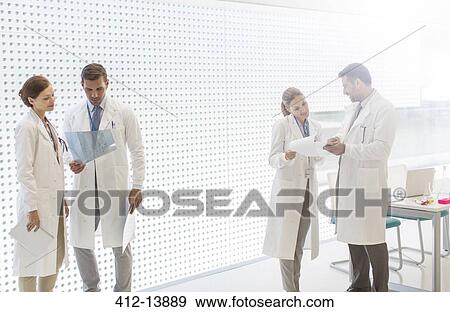 Stock Photo - Doctors working in hospital. Fotosearch