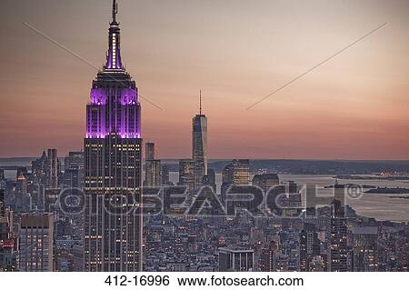 Empire State Building at sunrise, New York City, New York, United States View Large Photo Image Stock Photograph - Empire State Building at sunrise, New York City, New York, United States. Fotosearch