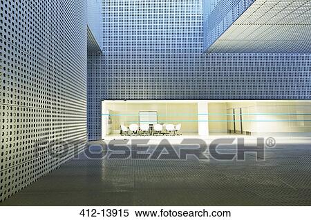 Stock Photography - Illuminated conference room in modern building. Fotosearch