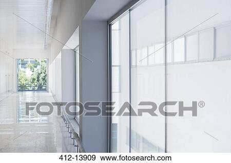 Long office corridor View Large Photo Image Stock Photo - Long office corridor. Fotosearch