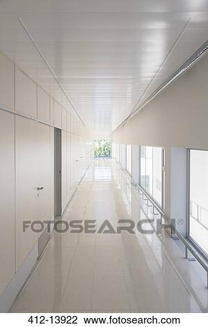 Long vacant corridor View Large Photo Image Stock Image - Long vacant corridor. Fotosearch