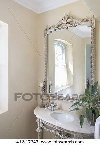 Stock Photo - Mirror and sink in luxury bathroom. Fotosearch