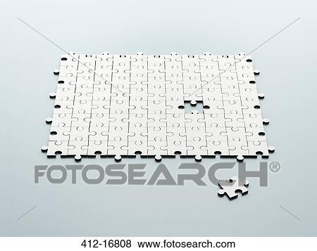 Missing jigsaw pieces View Large Photo Image Stock Photo - Missing jigsaw pieces. Fotosearch