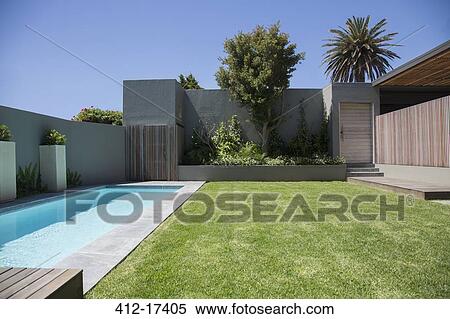 Stock Photography - Modern lap pool in backyard. Fotosearch