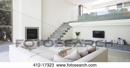 Modern living room with balcony View Large Photo Image Stock Image - Modern living room with balcony. Fotosearch