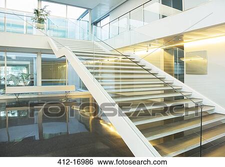 Modern lobby and staircase View Large Photo Image Stock Photograph - Modern lobby and staircase. Fotosearch