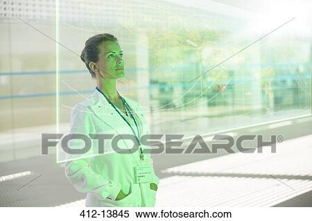 Stock Photography - Pensive doctor in hospital. Fotosearch