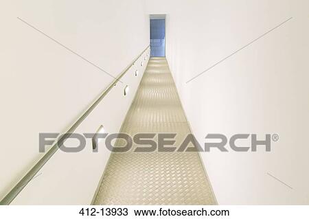 Person standing at top of steep ramp View Large Photo Image Stock Image - Person standing at top of steep ramp. Fotosearch