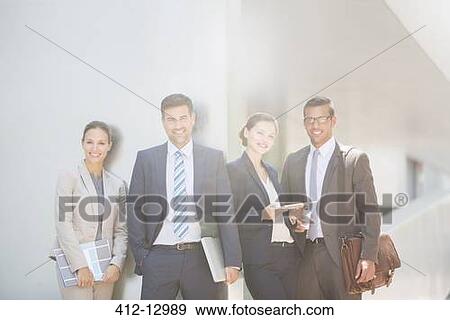 Stock Photo - Portrait of confident business people. Fotosearch