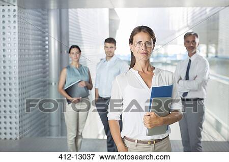 Portrait of confident business people View Large Photo Image Stock Photo - Portrait of confident business people. Fotosearch