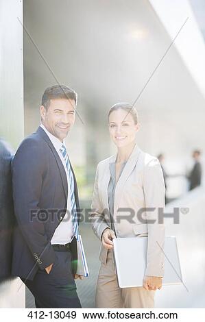 Portrait of confident business people outdoors View Large Photo Image Stock Photo - Portrait of confident business people outdoors. Fotosearch