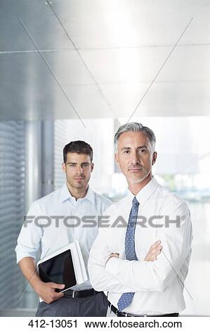 Portrait of confident businessmen View Large Photo Image Stock Image - Portrait of confident businessmen. Fotosearch