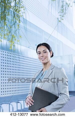 Portrait of confident businesswoman outdoors View Large Photo Image Stock Photo - Portrait of confident businesswoman outdoors. Fotosearch